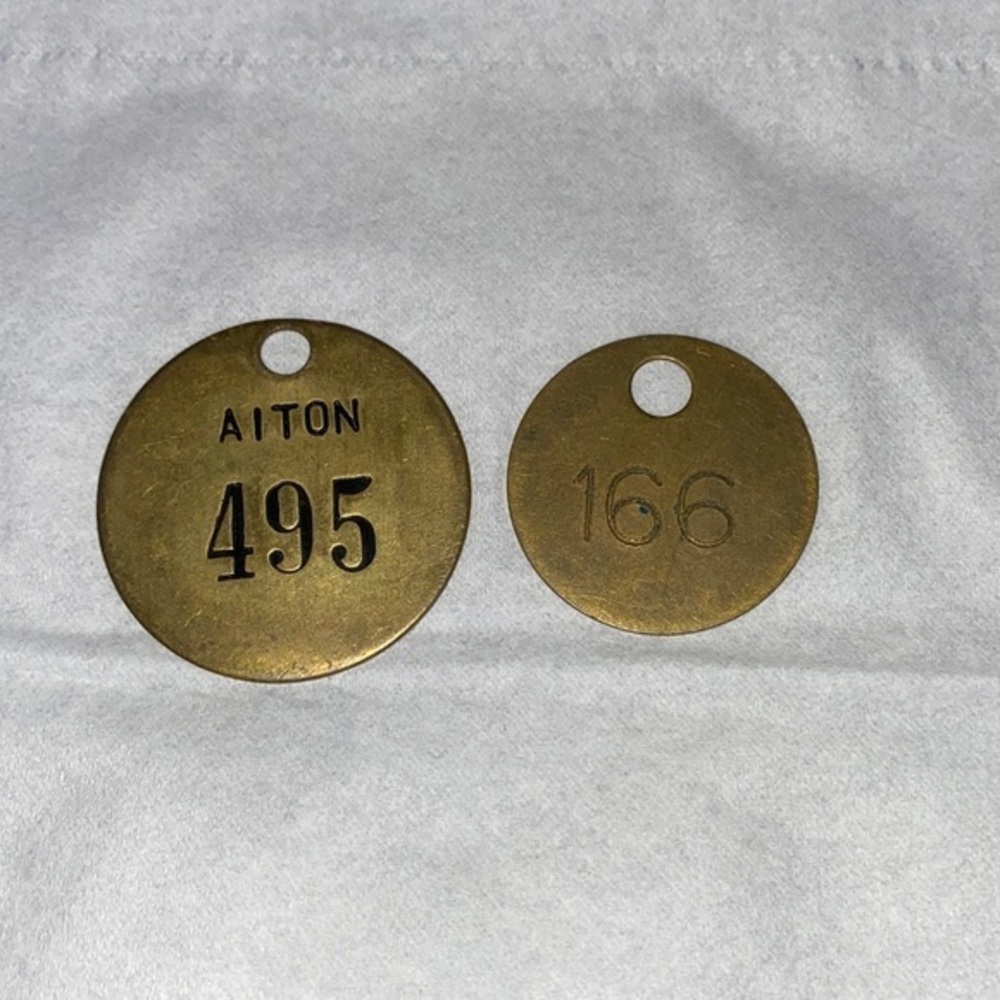 Antique Cape Breton Coal Mine Miners Tags 2 units is this offer